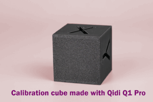 Side view of a calibration cube printed by Qidi Q1 Pro, emphasizing rapid prototyping and high-speed additive manufacturing in 3D printing.