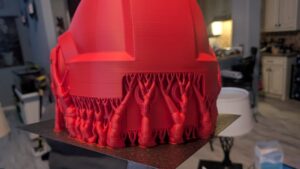 Right angle view of detailed cosplay helmet created on QIDI PLUS4 3D printer showing print quality