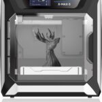 QIDI X-MAX 3 3D printer demonstrating additive manufacturing by printing a high-precision deer model with large build volume and fast layer deposition