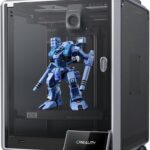 Creality K1C enclosed 3D printer producing a detailed blue mech model prototype
